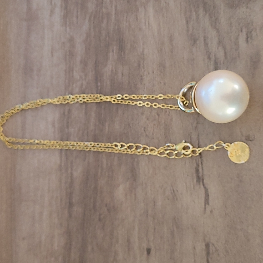Skinny by Jessica Elliot goldtone faux pearl pendant necklace .